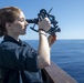 Quartermaster 3rd Class Jordan Boucher, from Worcester, Mass., uses a sextant to find the ship’s position