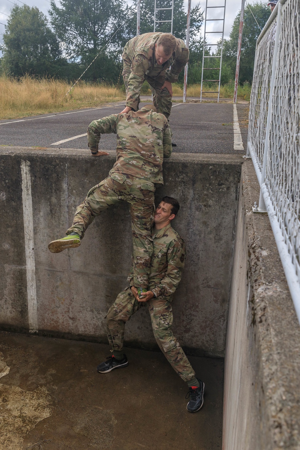 A team representing the United States of America, navigates an obstacle