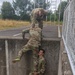 A team representing the United States of America, navigates an obstacle
