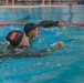 Capt. Mille Hewalo and Maj. Nicole Dallocchio finish the water obstacle course