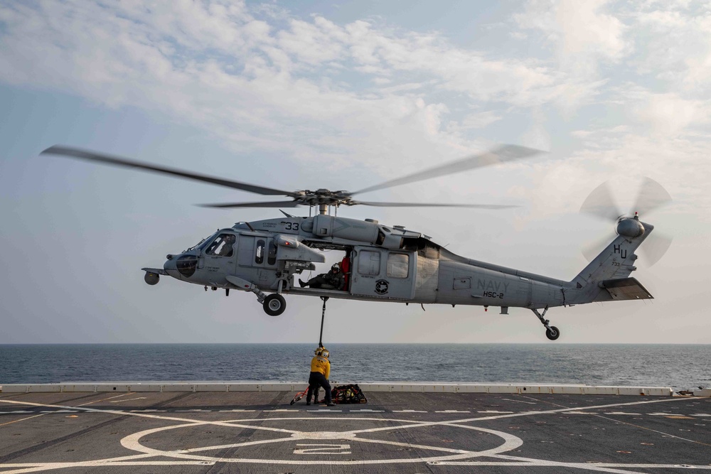 Arlington conducts flight operations with Helicopter Sea Combat Squadron (HSC) 2