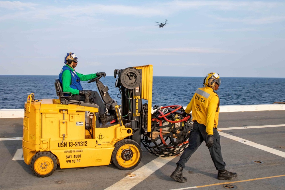 Arlington conducts flight operations with Helicopter Sea Combat Squadron (HSC) 2