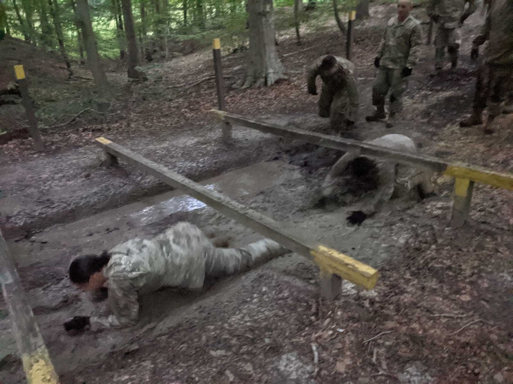 U.S. Army Soldiers Attending Advance Leaders Course complete the Obstacle Course