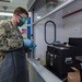 Aviation Boatswain’s Mate (Fuels) Tests Fuel Sample