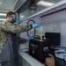 Aviation Boatswain’s Mate (Fuels) Tests Fuel Sample