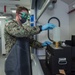 Aviation Boatswain’s Mate (Fuels) Tests Fuel Sample