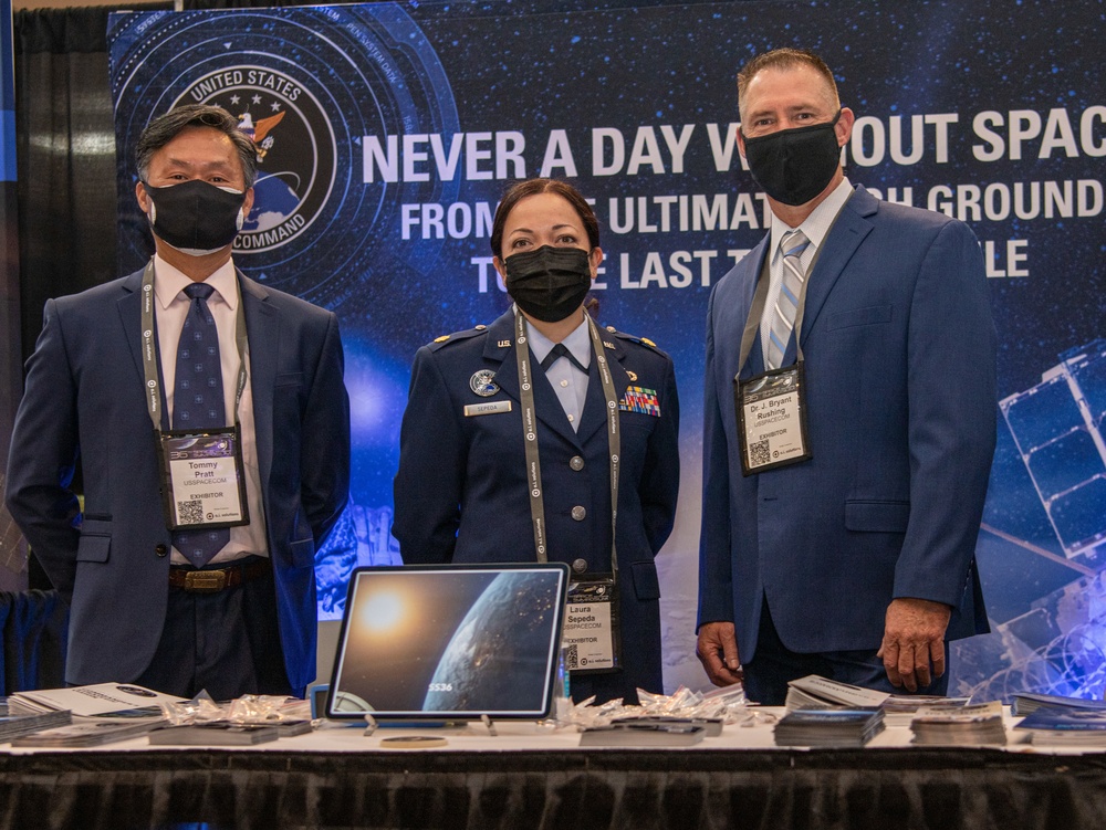 Personnel from U.S. Space Command at booth during Space Symposium