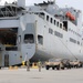 Soldiers Load Military Vehicles Onto U.S. Ship to Head Home