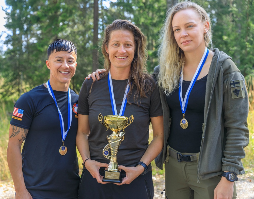 The top female team at the 2021 Interallied Confederation of Reserve Officers military competition pose for a picture