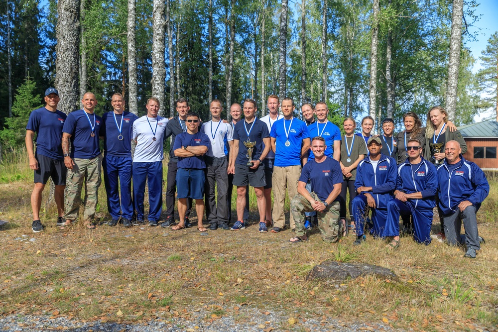 All of the competitors from the 2021 Interallied Confederation of Reserve Officers military competition pose for a picture