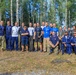 All of the competitors from the 2021 Interallied Confederation of Reserve Officers military competition pose for a picture