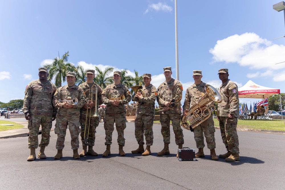 U.S. Army Medical Command leadership team poses with the 25th Infantry Band