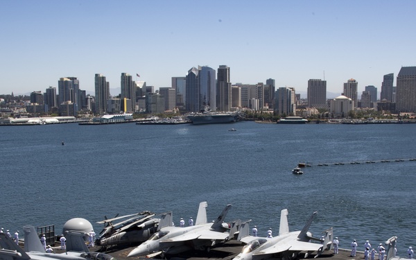 Sailors Aboard USS Carl Vinson (CVN 70) Man The Rails