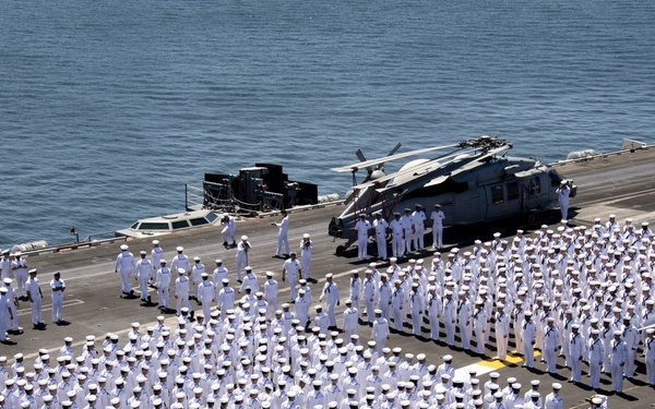 Sailors Aboard USS Carl Vinson (CVN 70) Man The Rails