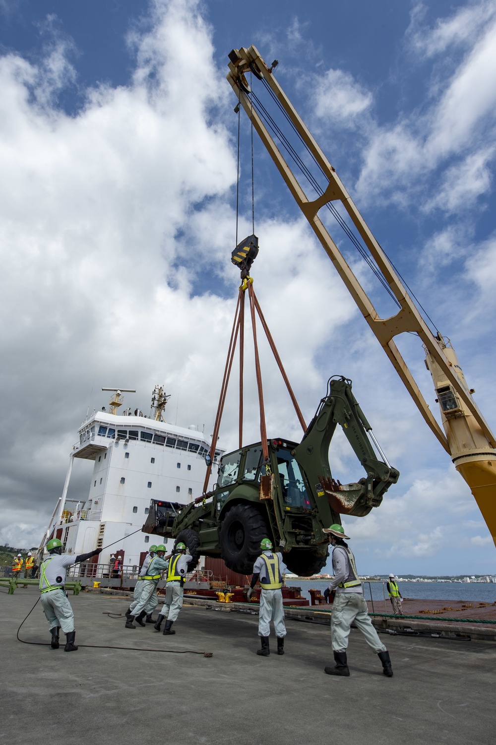 U.S. Army 835th Transportation Battalion and U.S. Navy Seabees with NMCB-5 transport civil engineer support equipment to Papua New Guinea