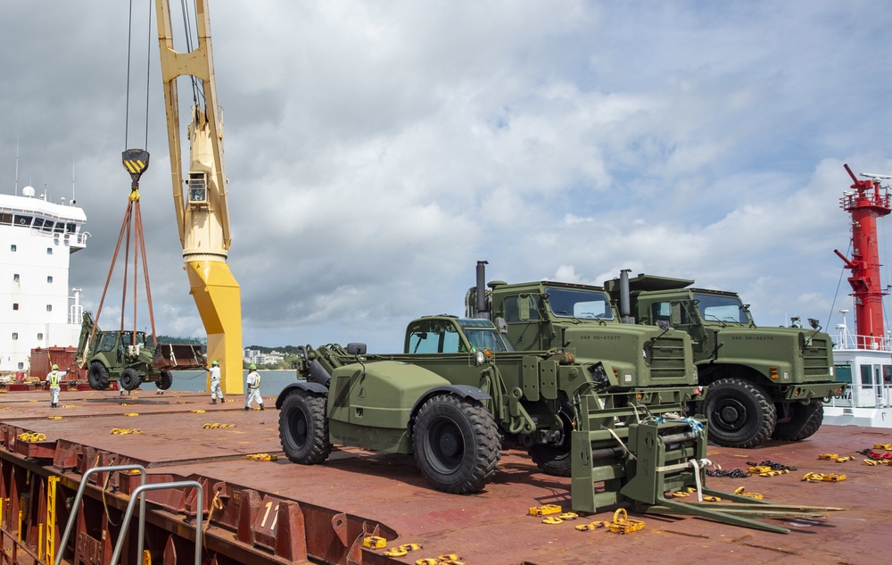 U.S. Army 835th Transportation Battalion and U.S. Navy Seabees with NMCB-5 transport civil engineer support equipment to Papua New Guinea