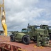 U.S. Army 835th Transportation Battalion and U.S. Navy Seabees with NMCB-5 transport civil engineer support equipment to Papua New Guinea