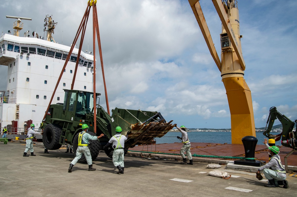 U.S. Army 835th Transportation Battalion and U.S. Navy Seabees with NMCB-5 transport civil engineer support equipment to Papua New Guinea