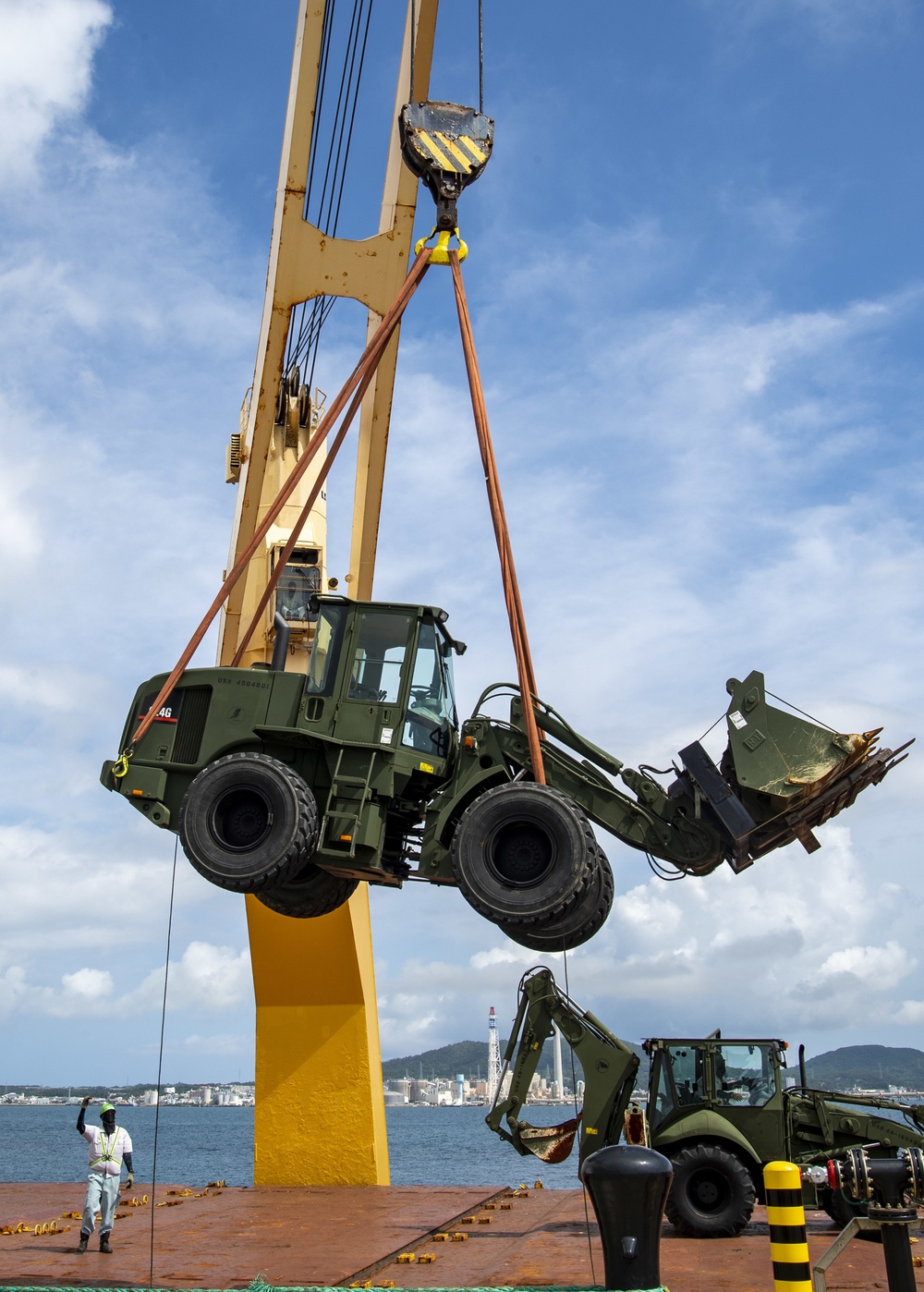 U.S. Army 835th Transportation Battalion and U.S. Navy Seabees with NMCB-5 transport civil engineer support equipment to Papua New Guinea