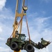 U.S. Army 835th Transportation Battalion and U.S. Navy Seabees with NMCB-5 transport civil engineer support equipment to Papua New Guinea