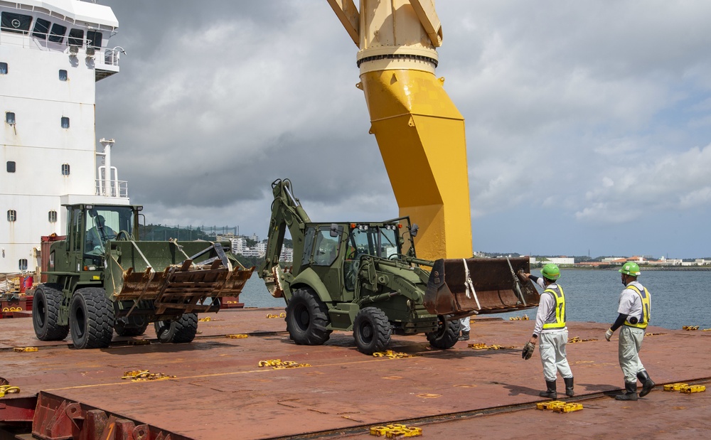 U.S. Army 835th Transportation Battalion and U.S. Navy Seabees with NMCB-5 transport civil engineer support equipment to Papua New Guinea