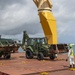 U.S. Army 835th Transportation Battalion and U.S. Navy Seabees with NMCB-5 transport civil engineer support equipment to Papua New Guinea