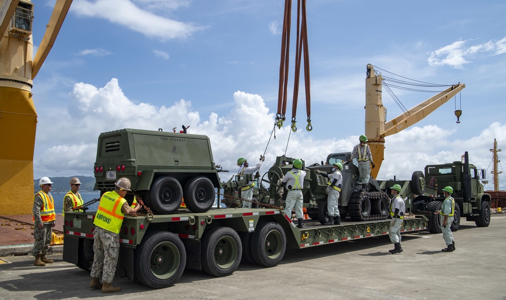 U.S. Army 835th Transportation Battalion and U.S. Navy Seabees with NMCB-5 transport civil engineer support equipment to Papua New Guinea