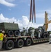 U.S. Army 835th Transportation Battalion and U.S. Navy Seabees with NMCB-5 transport civil engineer support equipment to Papua New Guinea