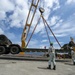 U.S. Army 835th Transportation Battalion and U.S. Navy Seabees with NMCB-5 transport civil engineer support equipment to Papua New Guinea