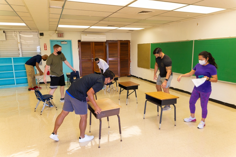 Volunteers help Finegayan Elementary School prepare for the upcoming school year