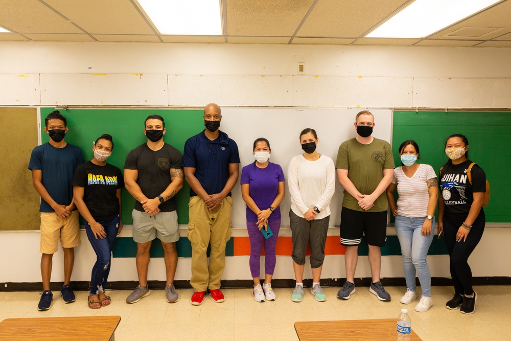 Volunteers help Finegayan Elementary School prepare for the upcoming school year