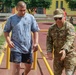 Col. Ryan “MZ” Montanez gives tips to a Romanian Reserve service member