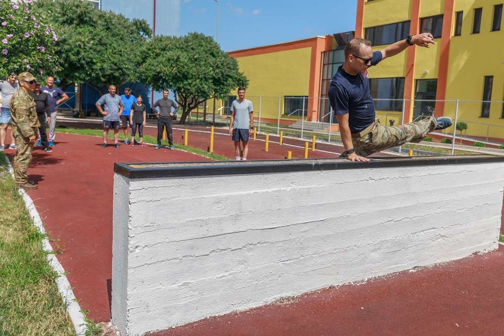 Sgt. Morgan Figgs demonstrates an obstacle