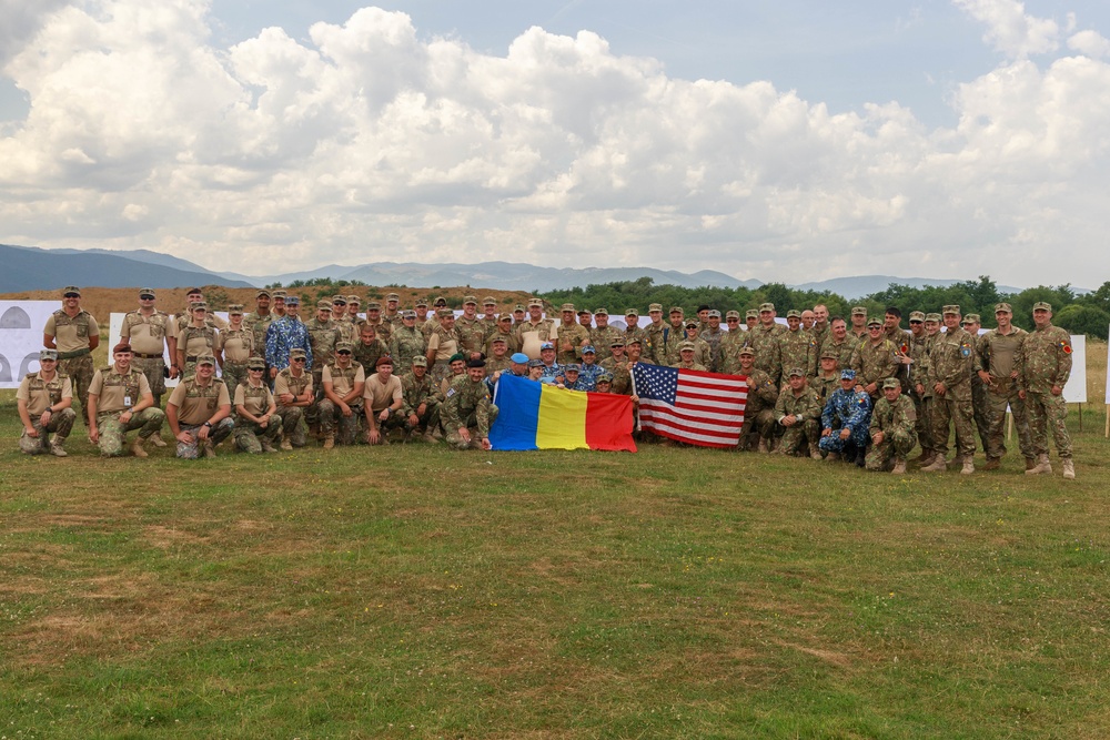 American and Romanian reserve service members pose for a photo