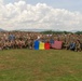 American and Romanian reserve service members pose for a photo