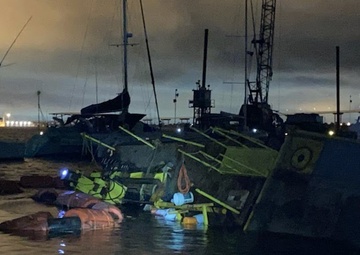 Coast Guard, partner agencies respond to capsized dredge barge Capt Leo II