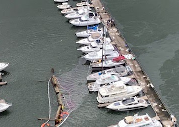 Coast Guard, partner agencies respond to capsized dredge barge Capt Leo II