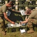 U.S. Army Spc. Eli Fox and Sgt. Stephen Sorleder Combat Medics Restock Medical Kits during Northern Strike 21-2