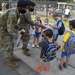 Defenders welcome kids on first day of school