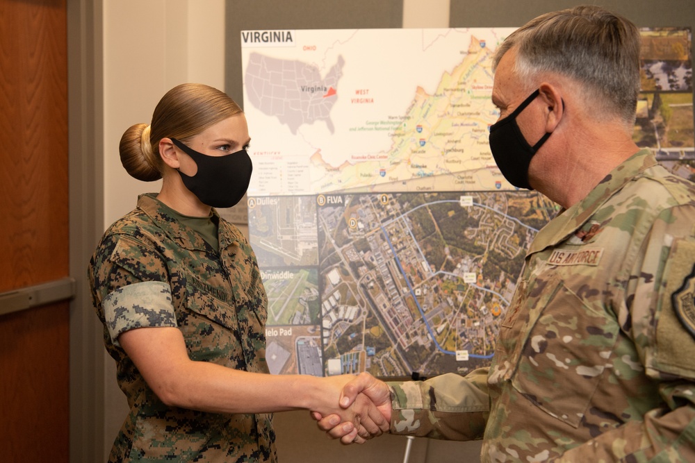 NORTHCOM commander presents coins to Task Force Eagle members