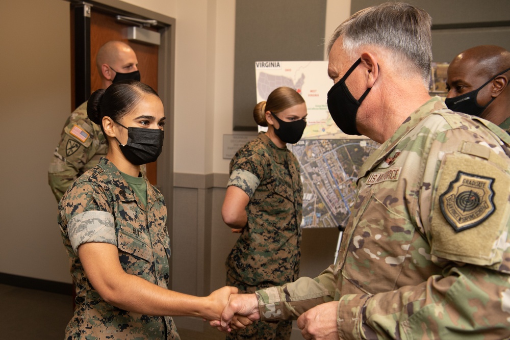 NORTHCOM commander presents coins to Task Force Eagle members