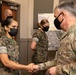 NORTHCOM commander presents coins to Task Force Eagle members