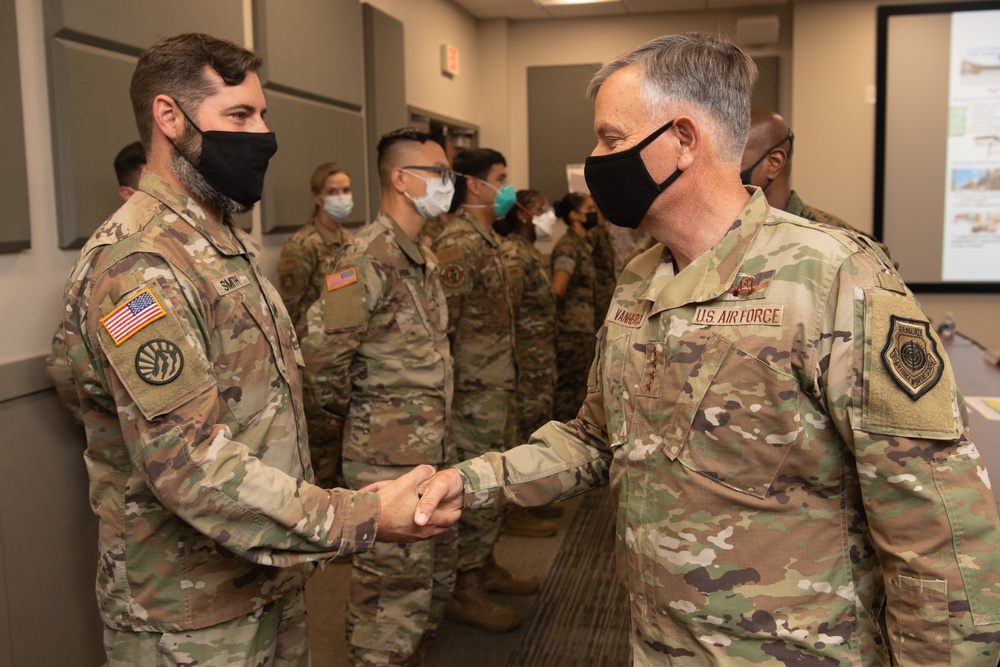 NORTHCOM commander presents coins to Task Force Eagle members