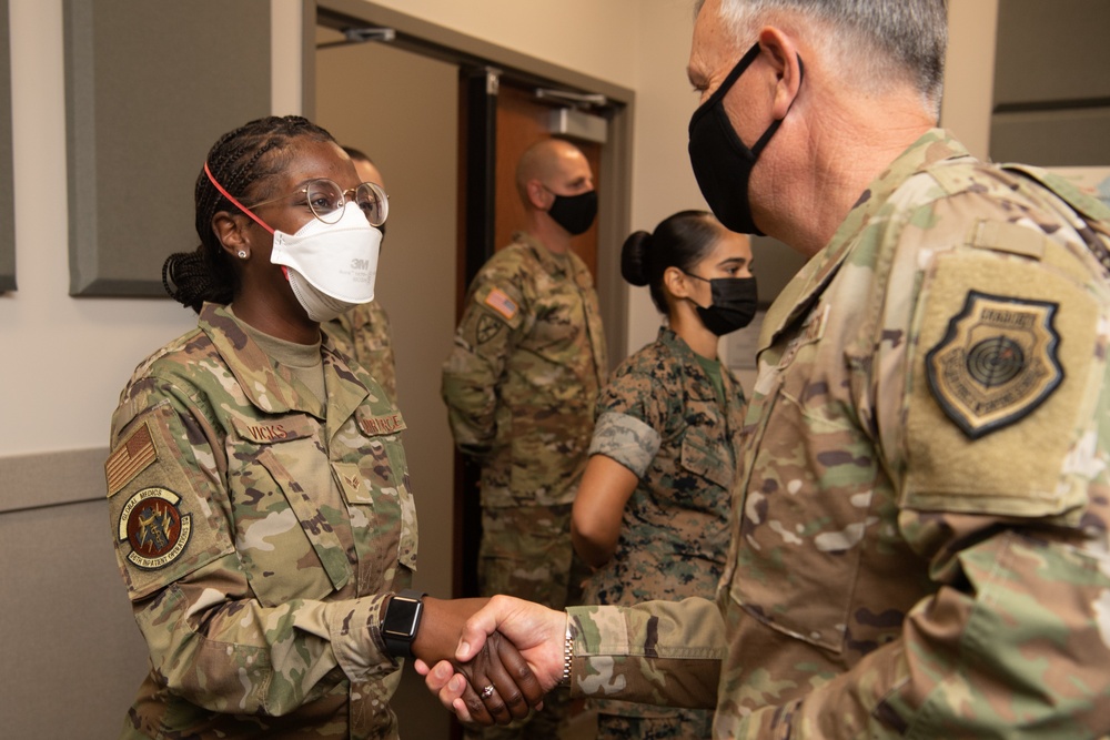 NORTHCOM commander presents coins to Task Force Eagle members