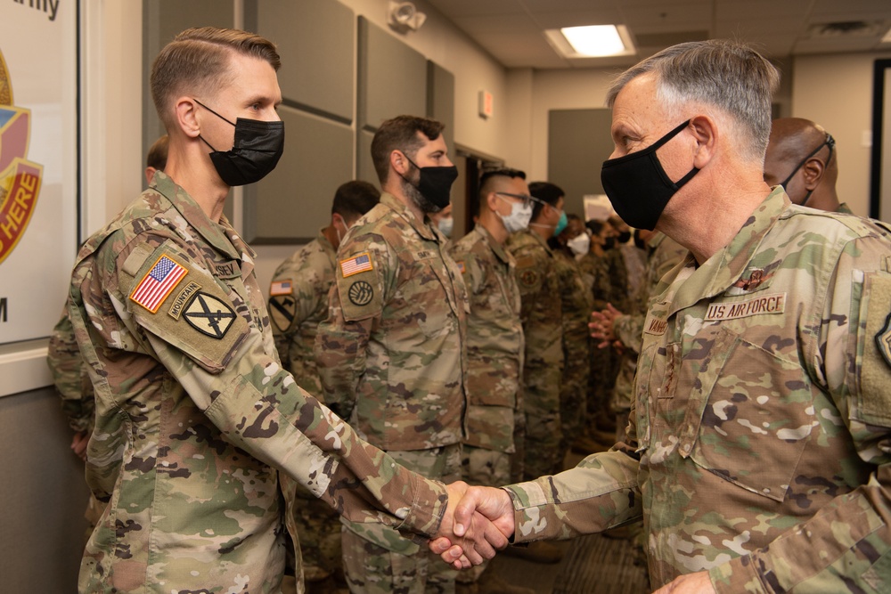 NORTHCOM commander presents coins to Task Force Eagle members