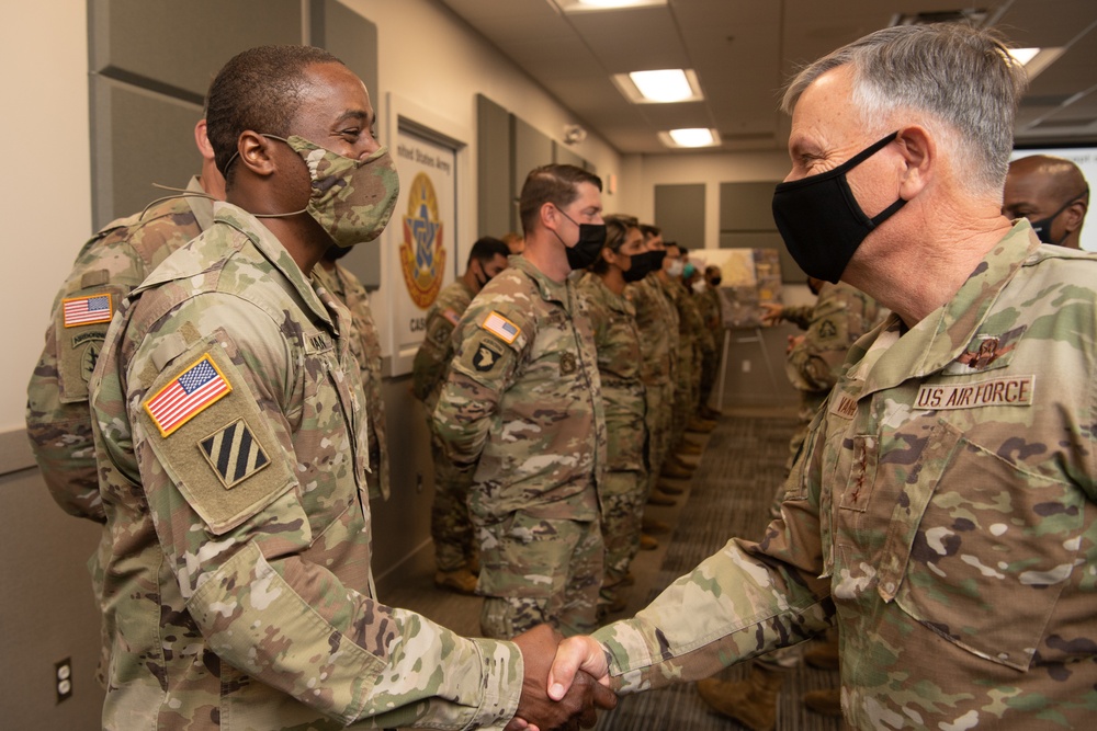 NORTHCOM commander presents coins to Task Force Eagle members