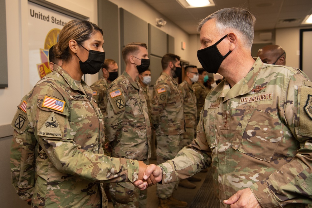 NORTHCOM commander presents coins to Task Force Eagle members