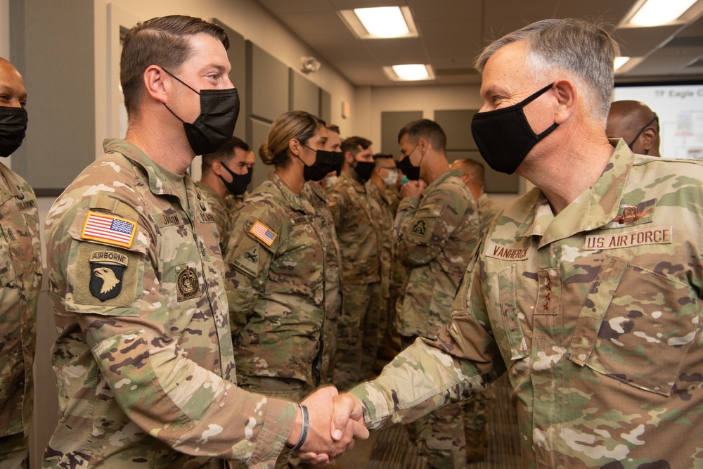 NORTHCOM commander presents coins to Task Force Eagle members