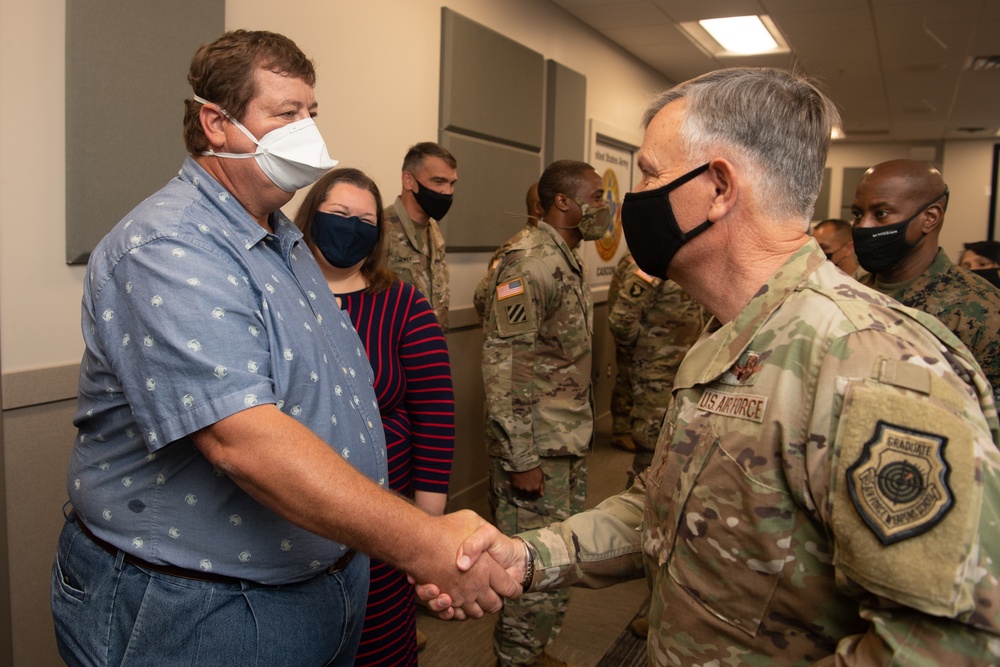 NORTHCOM commander presents coins to Task Force Eagle members