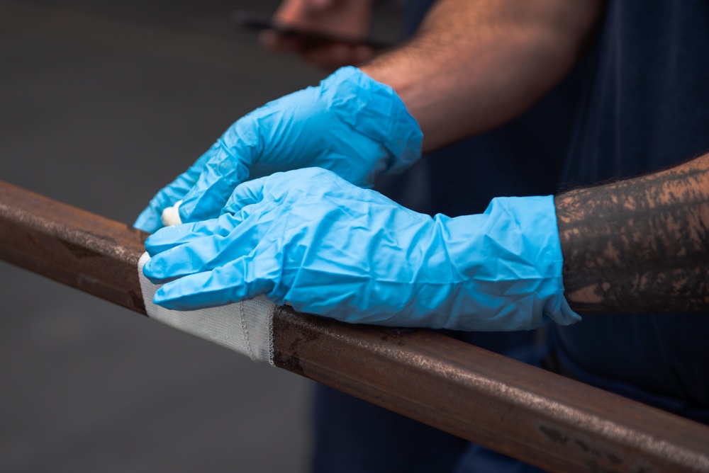 Members aboard Coast Guard Cutter Munro participate in damage control training